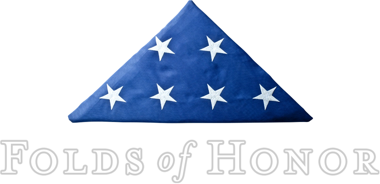 Folded American flag with white stars on blue.